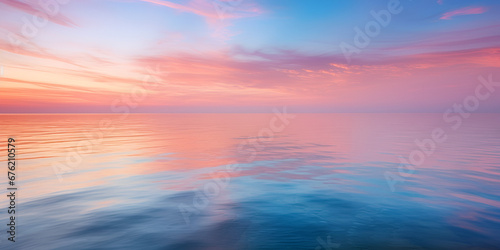 A beautiful sunset reflecting on a calm and serene body of water Nature's Canvas A Beautiful Sunset Mirrored in Calm Waters