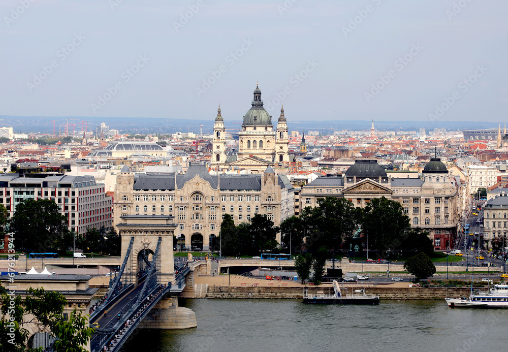 Budapest, B, Hungary - August 18, 2023: Skyline with Bridge of chains and church of Saint Stephen