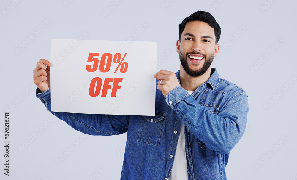 Man, poster and excited with sale in portrait, shopping discount and retail announcement by studio mockup. Young person, paper and board for sales promotion with news launch by white background Man, poster and excited with sale in portrait, shopping discount and retail announcement by studio mockup. Young person, paper and board for sales promotion with news launch by white background