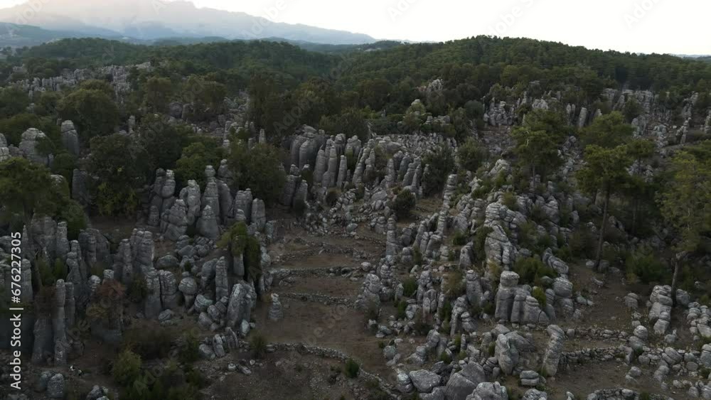 Unusual rock formations dominate countryside landscape scenery. Aerial Unusual rock formations dominate countryside landscape scenery. Aerial