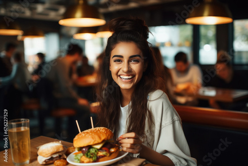 Indian college girl eating burger