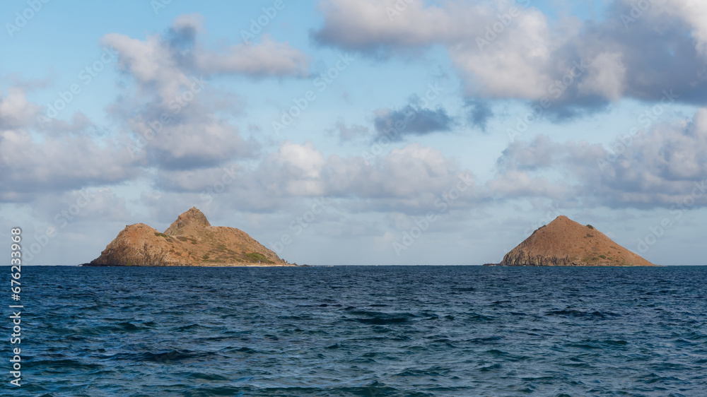 View of the Mokulua Islands from the Lanikai Beach on the island of Oahu, Hawaii