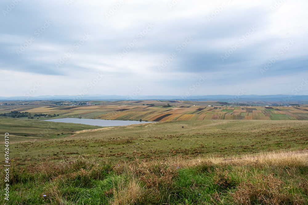 Autumn moody landscape of meadows and fields of Romania Autumn moody landscape of meadows and fields of Romania