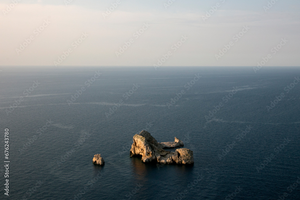 Fototapeta premium Views of the sea and Ses Margalides of Ibiza from the cliffs in the north of the island in Santa Agnes de Corona