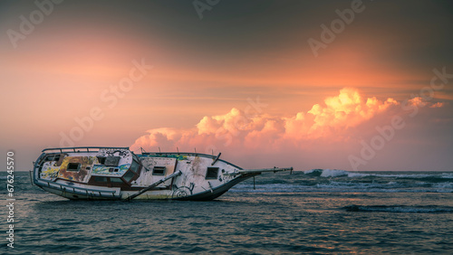 ship aground off a Caribbean beach, Puerto Viejo, Costa Rica photo