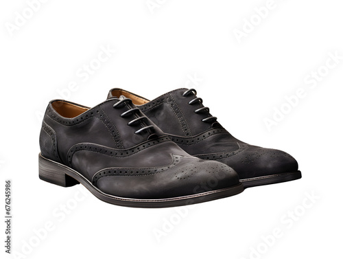 Sophisticated dark grey suede dress shoes with intricate brogue details on a plain background.