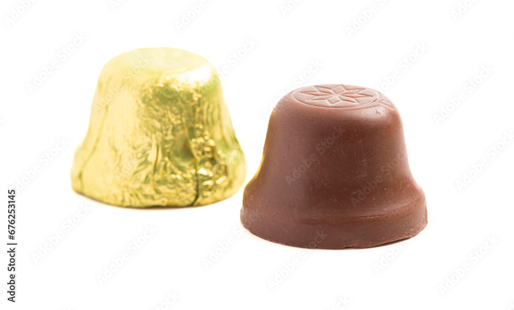 Unwrapped Bell Shaped Chocolate Candy on White Background Unwrapped Bell Shaped Chocolate Candy on White Background