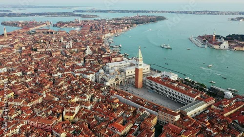 Aerial orbit view of St Mark's square and lagoon, Venice, Italy photo