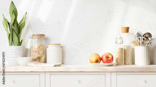 Set of various kitchen utensils and containers with food ingredient on rustic wooden sideboard table