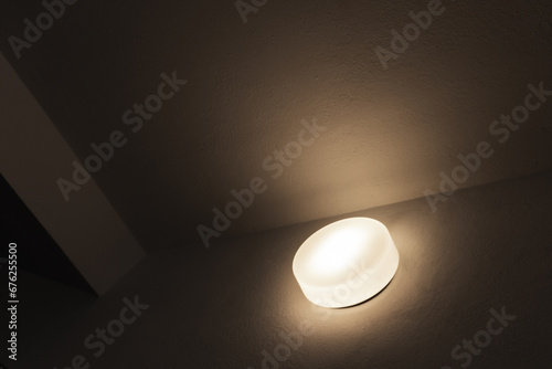 Abstract minimal interior with round sconce light, architecture background