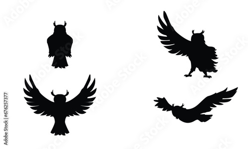 owl 4 diiferent poses silhouettes set