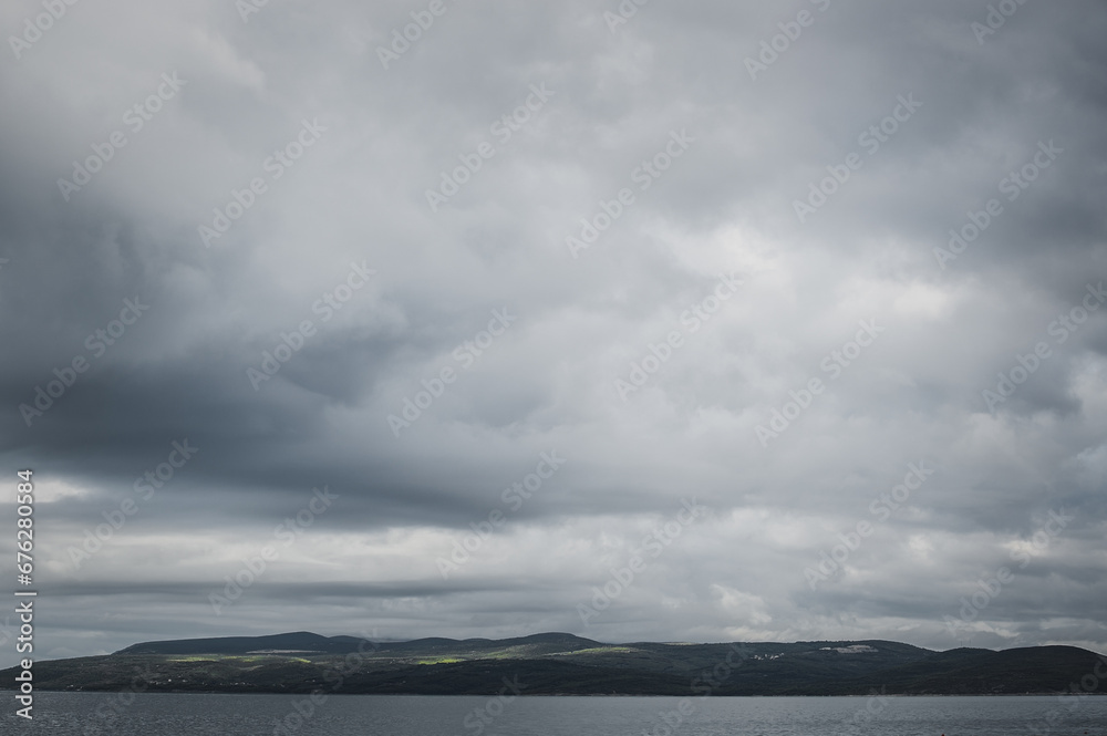 Stormy clouds over the Adriatic sea in Croatia. Beautiful cloudy seaside of Croatian Riviera