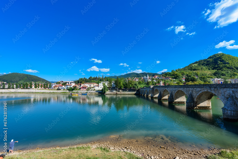 Visegrad, Bosnia and Herzegovina - August 13, 2023: Famous bridge on the Drina in Visegrad, Bosnia and Herzegovina. Mehmed Pasa Sokolovic Bridge on Drina River