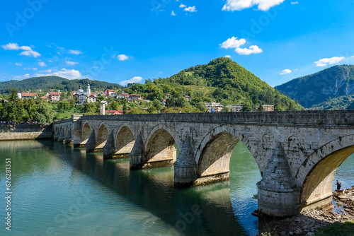 Visegrad, Bosnia and Herzegovina - August 13, 2023: Famous bridge on the Drina in Visegrad, Bosnia and Herzegovina. Mehmed Pasa Sokolovic Bridge on Drina River