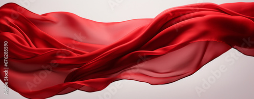 Red Silk cloth flying in air isolated on white background