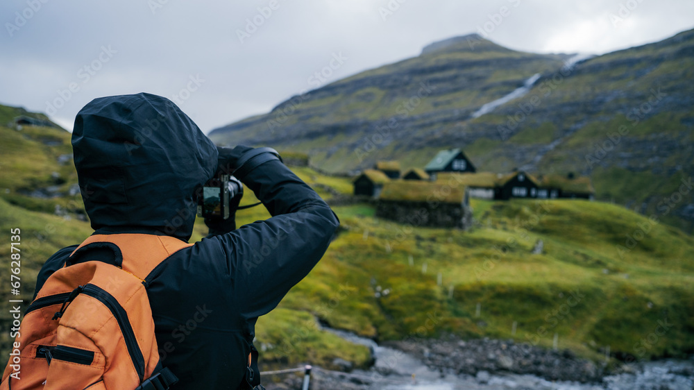 A photographer capturing the essence of Faroese charm. Through her lens, the quaint houses come to life, telling stories of generations past and echoing the whispers of the winds Faroe Islands A photographer capturing the essence of Faroese charm. Through her lens, the quaint houses come to life, telling stories of generations past and echoing the whispers of the winds Faroe Islands