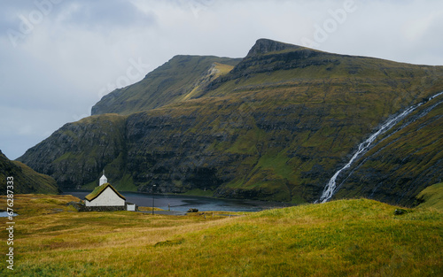 The ´lagoon seen from Saksun on Streymoy Island, Faroe Islands. The Waterfalls is filling the small lake. photo