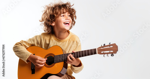 Boy in sunglasses posing with guitar as rock star,Joyful boy playing guitar isolated on flat isolated on white background with copy space.