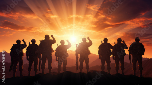 Military silhouettes of soldiers against the backdrop of sunset sky Silhouette of soldiers Concept - armed forces.