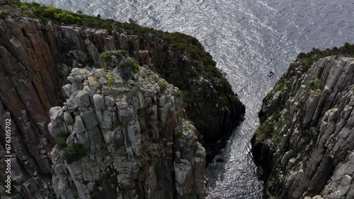 Aerial: Coast of Tasmania with giant cliffs photo