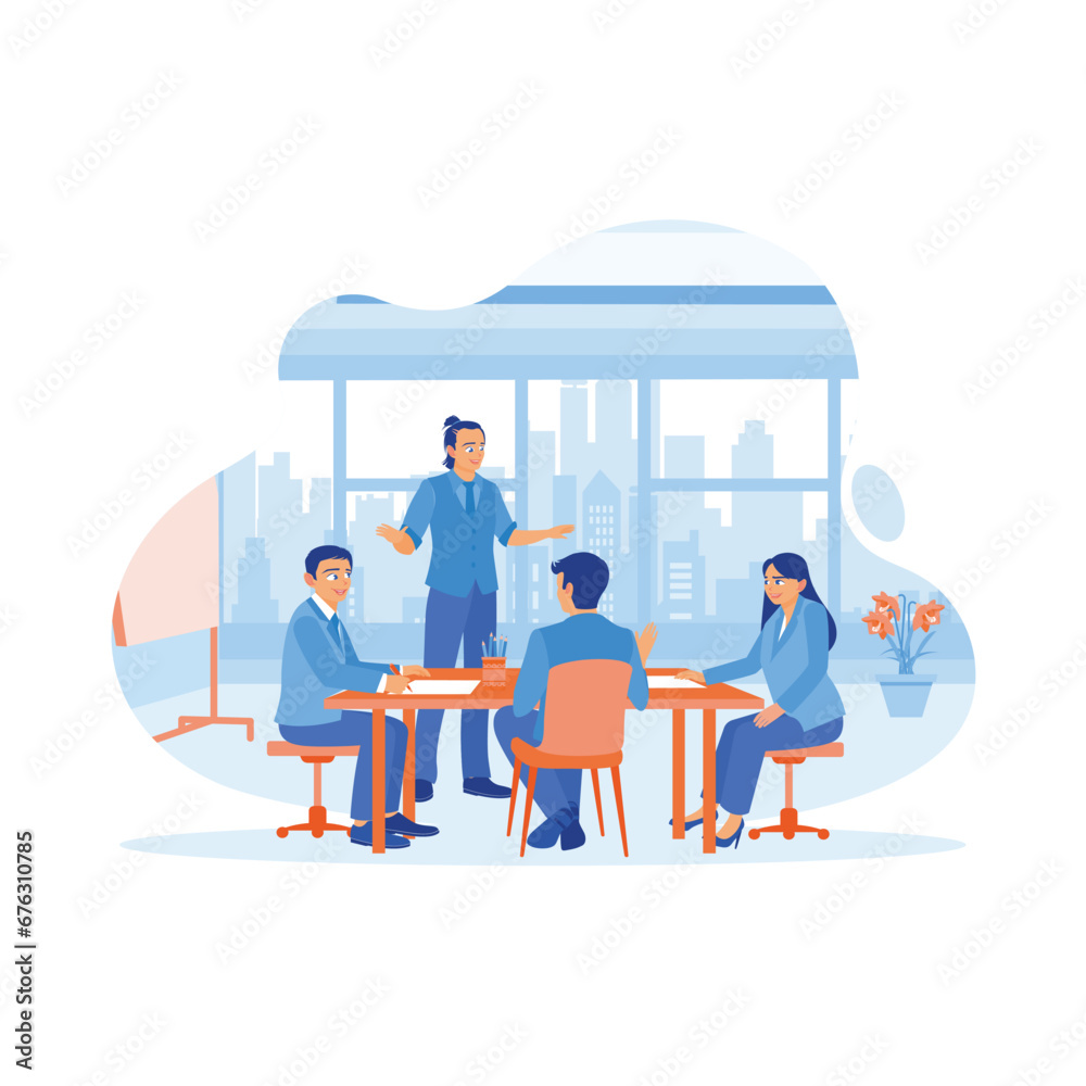 A mature man leads meetings with diverse coworkers in the office. Colleagues listen to the meeting leader's explanation and exchange ideas. Business people in office workplace concept. 