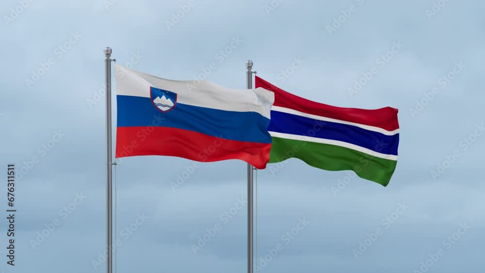 Gambia flag and Slovenia flag waving together on cloudy sky, endless seamless loop, two country relations concept Gambia flag and Slovenia flag waving together on cloudy sky, endless seamless loop, two country relations concept