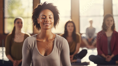 Group, diverse and meditation in a studio for mindfulness practise and spirituality. People sitting, deep breathing and religion for mental health, burnout, zen, calm and stress free lifestyle. Mind,