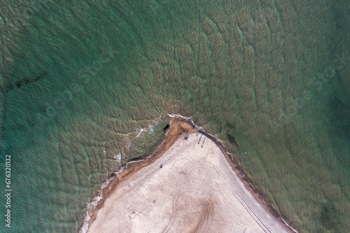 Obraz na płótnie Aerial view directly above the Grenen - a meeting point of North and Baltic Sea (Skagerrak and Kattegat) on Skagen Odde peninsula. North Jutland, Nordjylland, Denmark w salonie