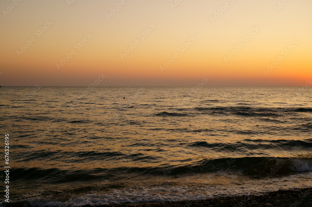Sunset on the seashore. Beautiful landscape.