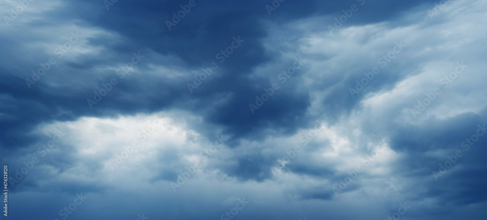 Dramatic sky with dark dense clouds before a thunderstorm