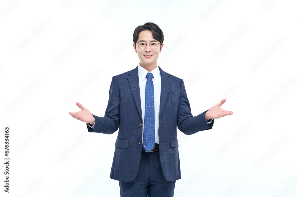 A young and handsome Asian man in a suit is wearing glasses and making various facial expressions and hand gestures. A young and handsome Asian man in a suit is wearing glasses and making various facial expressions and hand gestures.