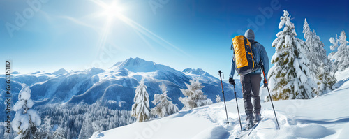Ski walking or touring in winter alpine moutains. © Milan