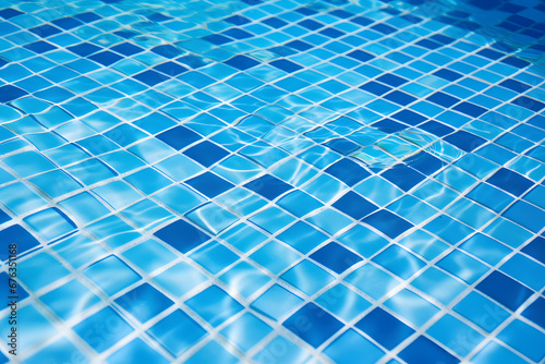Water pool with sun reflection and two colored blue floor tiling