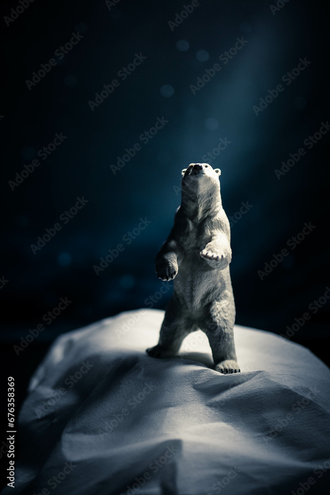Polar bear figurine in climate change, global warming still life ...