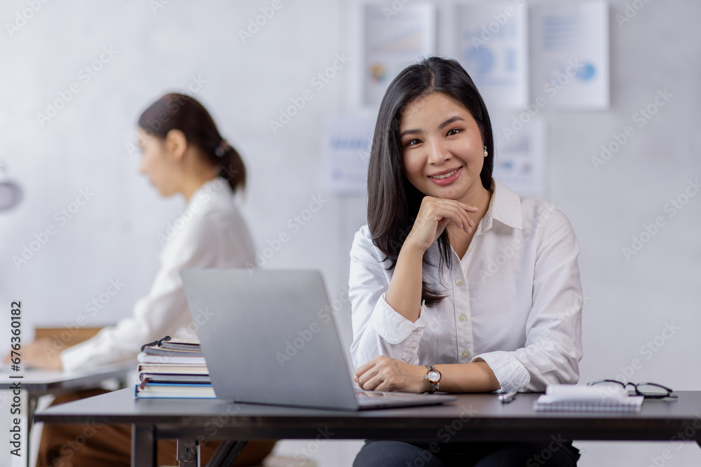 Business woman working at office with documents on his desk, doing planning analyzing the financial report, business plan investment, finance analysis concept Business woman working at office with documents on his desk, doing planning analyzing the financial report, business plan investment, finance analysis concept