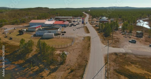 Aerial view of road 92 and the village of Näätämö in spring, Lapland, Finland. photo