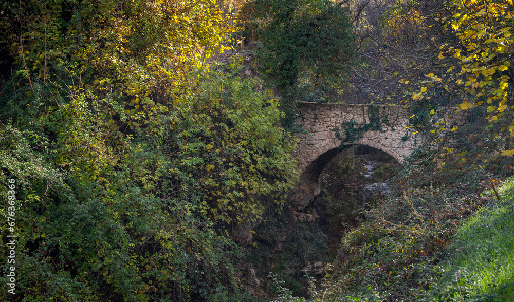 Stone bridge over the Cerezuelo river, in the municipality of Cazorla, province of Jaen, Andalusia, Spain Stone bridge over the Cerezuelo river, in the municipality of Cazorla, province of Jaen, Andalusia, Spain