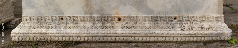 Old plaster sculptures and bas-reliefs, wall texture and patterns. Elements of architectural decorations of buildings. On the streets in Istanbul, public places. Old plaster sculptures and bas-reliefs, wall texture and patterns. Elements of architectural decorations of buildings. On the streets in Istanbul, public places.