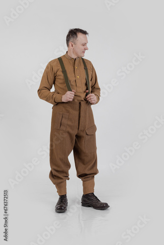 The man is an actor in vintage military uniform of the American soldier, period World War I, 1914-1918