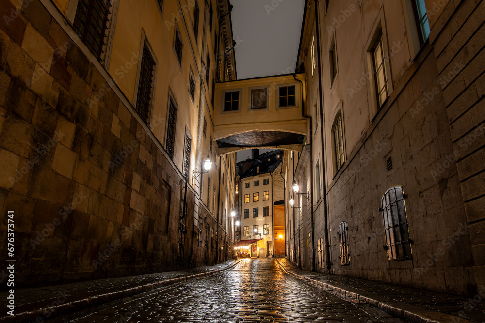 Stockholm, Sweden  The Norra Bankogrand street in Gamla Stan or Old Town in the rain at night