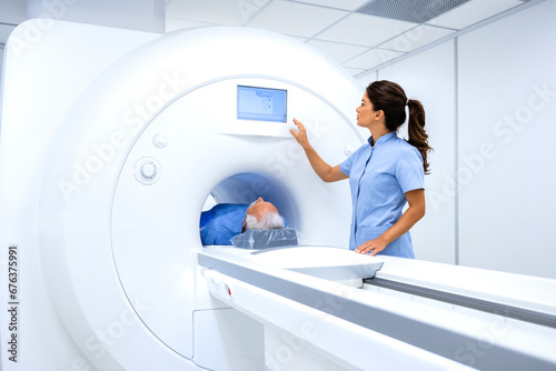 Bild auf Leinwand MRI technician radiologist preparing patient for full body examination in hospital diagnostic center