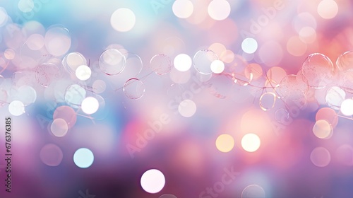 An array of bokeh lights in soft pastel colors. 