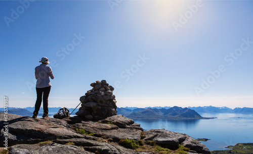 woman on the top of the hill