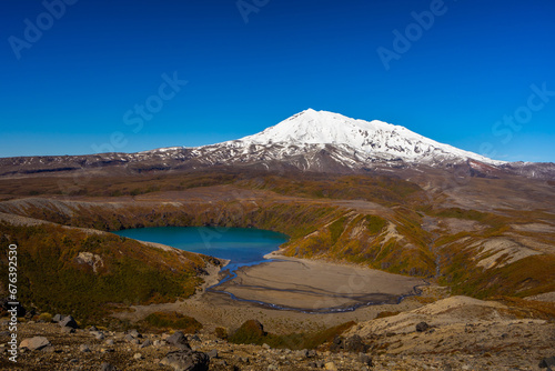 Photos of volcano Mount Ruapehu and Tama lake in front in New Zealand.