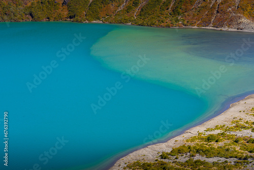PhoDetailed photo of Lower Tama Lake in New Zealand and its water with mixing colors.