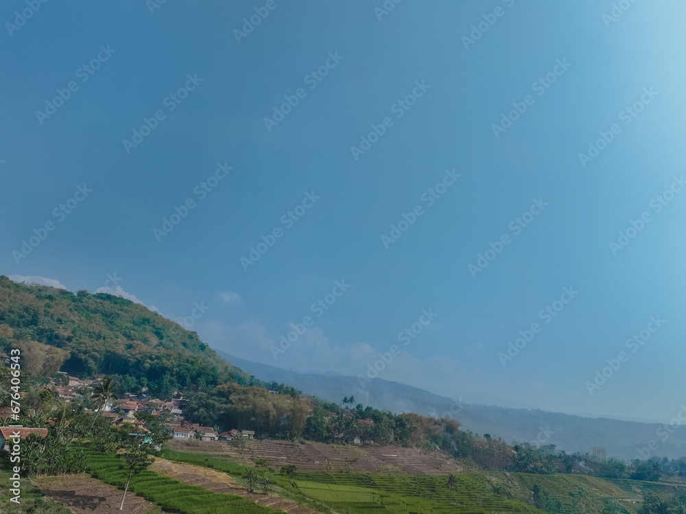 Java Landscape in the Morning with Hills & Rice FIeld Java Landscape in the Morning with Hills & Rice FIeld