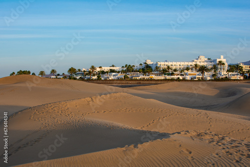 Sand dunes of Maspalomas with a view of the city on Gran Canaria, Spain