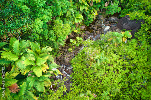 Drone photgraphy of the upper part of Sauzier waterfall on, surrounded by lush forest, Mahe Seychelles