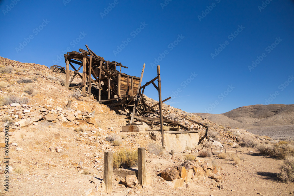 Old wooden mining entrance at Eureka Gold Mine in the desert, Death Valley National Park, California Old wooden mining entrance at Eureka Gold Mine in the desert, Death Valley National Park, California
