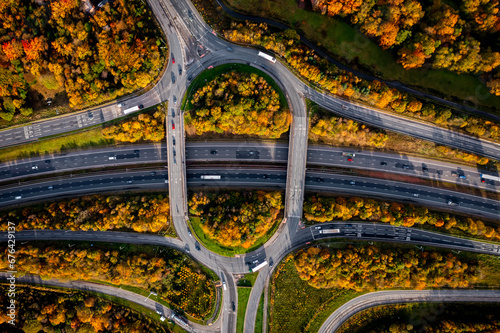 Aerial view directly above a major UK motorway junction with Autumn colours photo